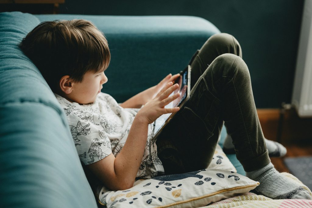 Child staring at ipad screen